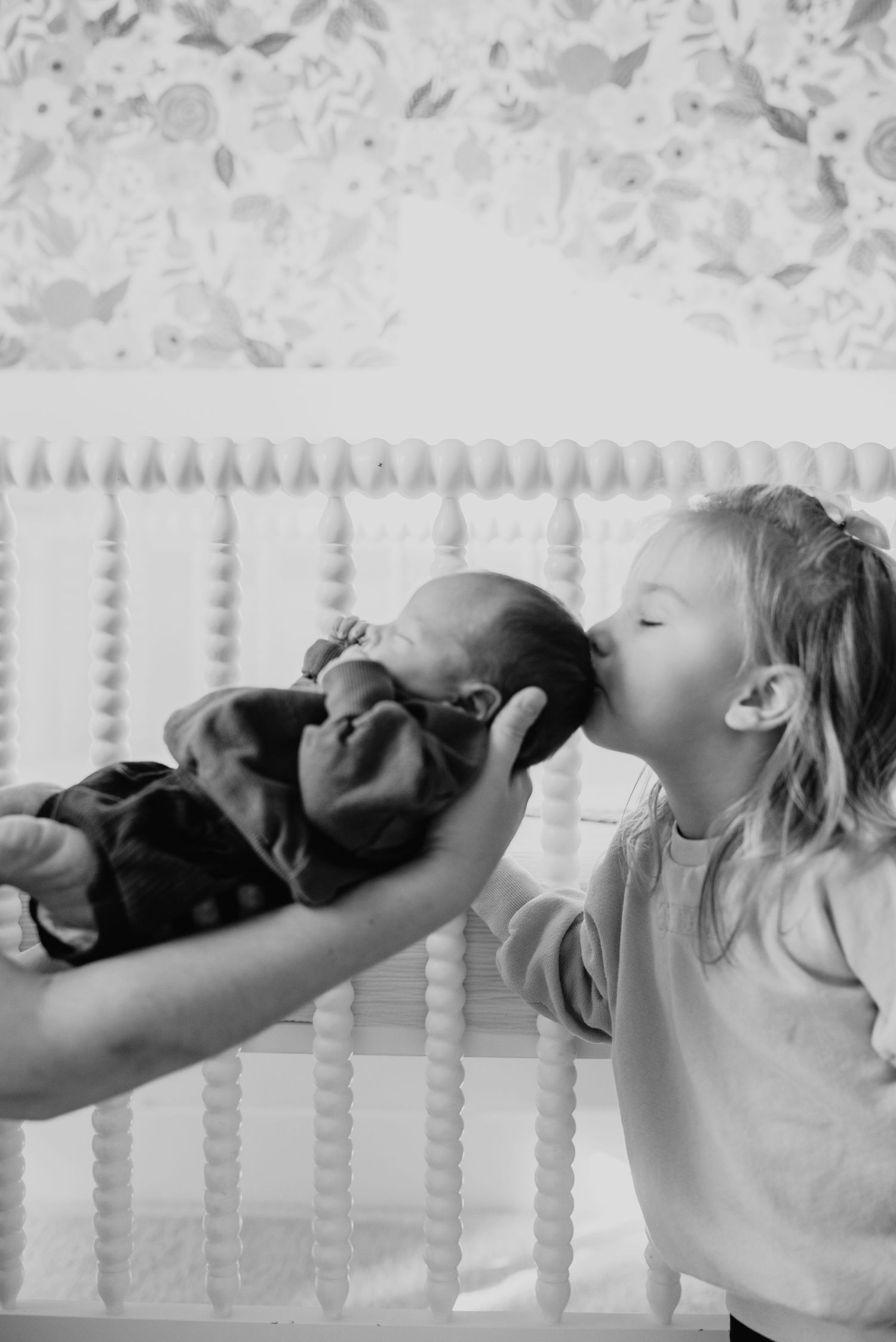 Black and white artistic portraits showing different angles against a white railing background.
