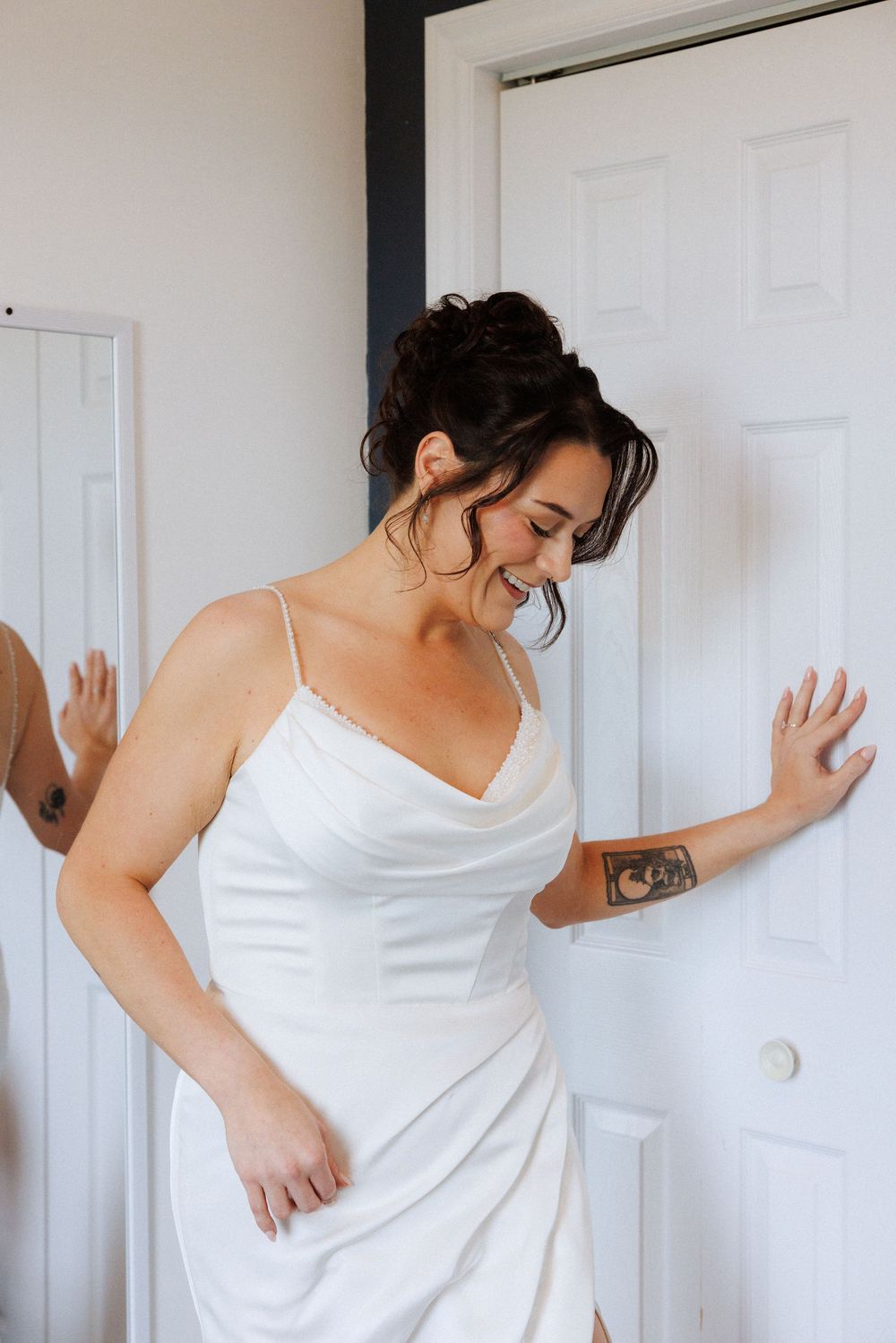 Bride getting ready at a Trinity Airbnb by Newfoundland documentary style wedding photographer Kaitlyn Yvette