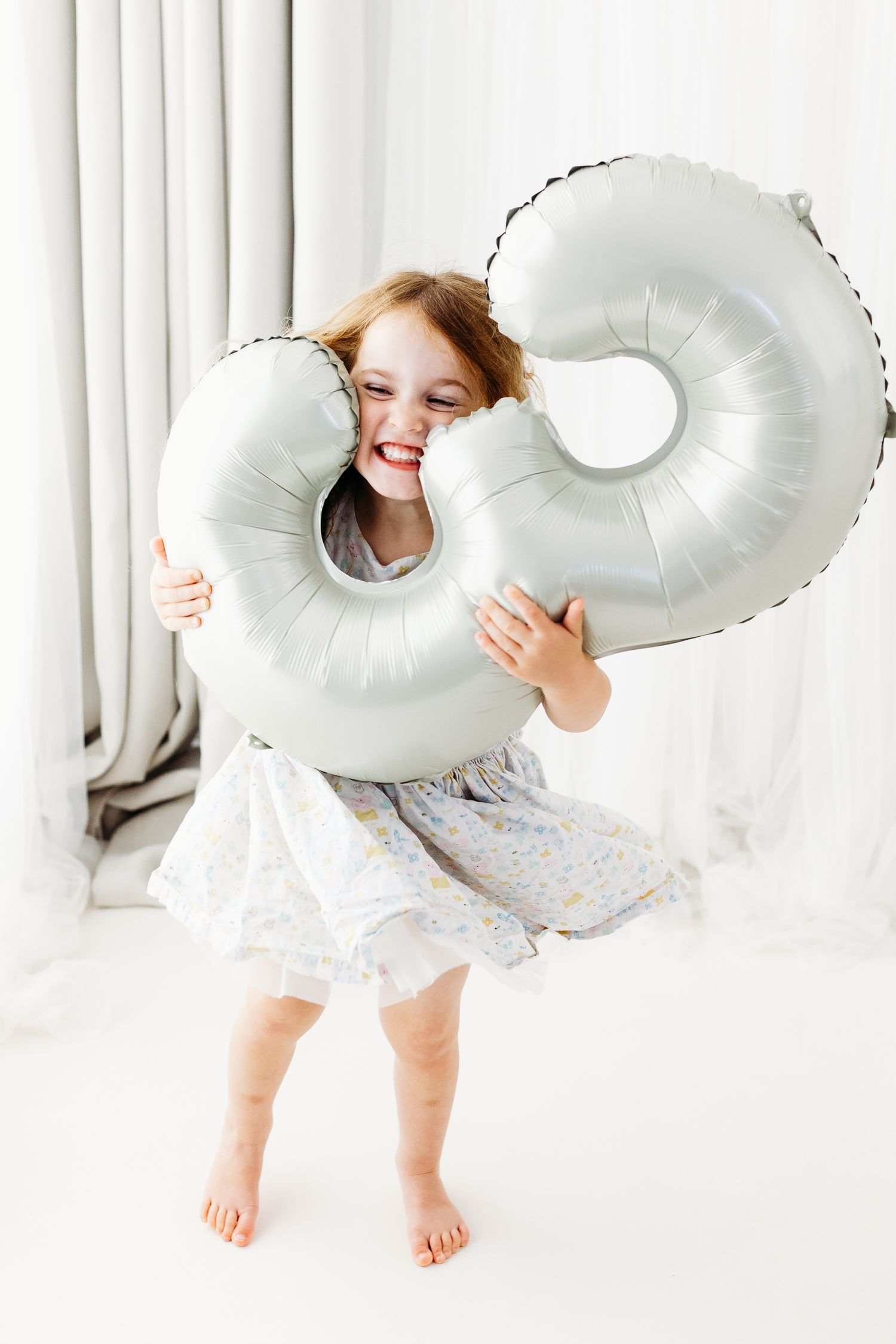 Toddler milestone photoshoot in Nottingham studio, playful and relaxed portraits captured with minimal styling.