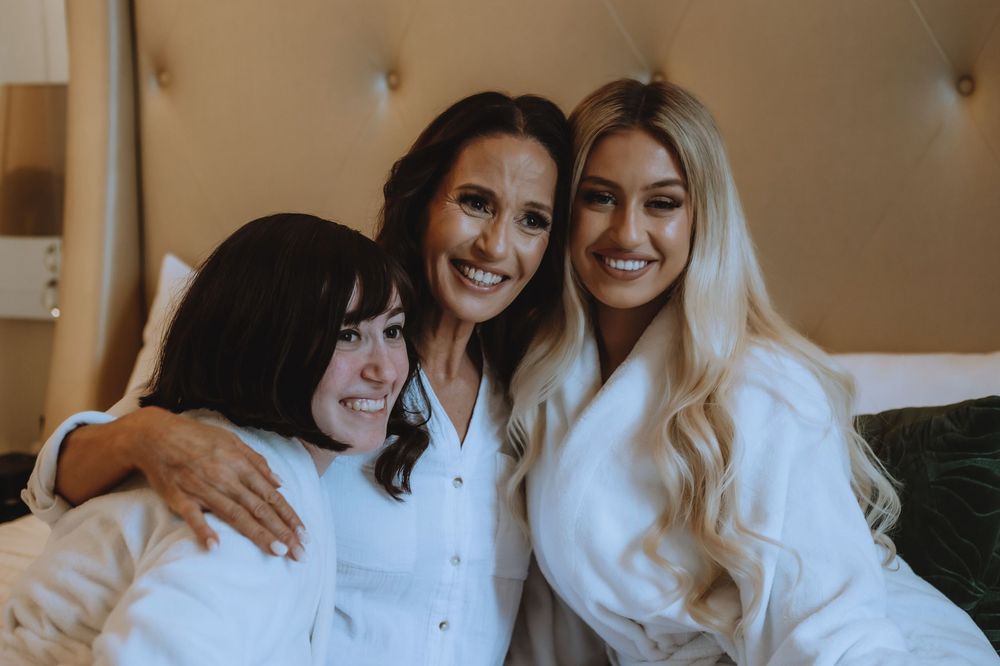 A collection of candid moments showing people in white tops sharing embraces and laughter.