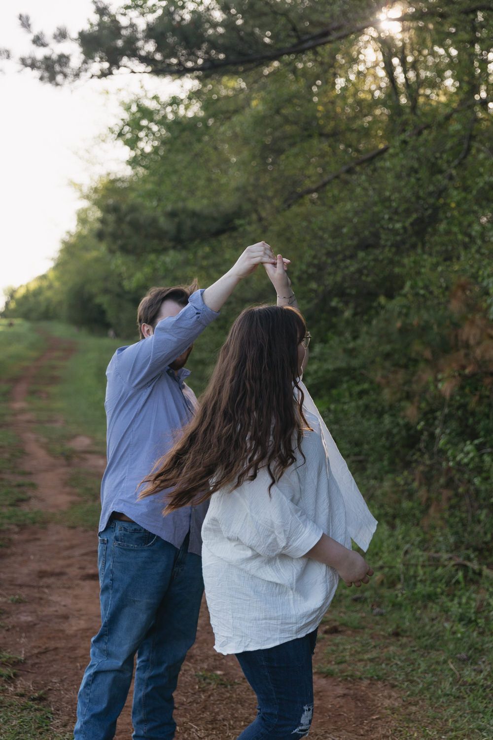 Candid laughing engagement photos Green Meadows Preserve