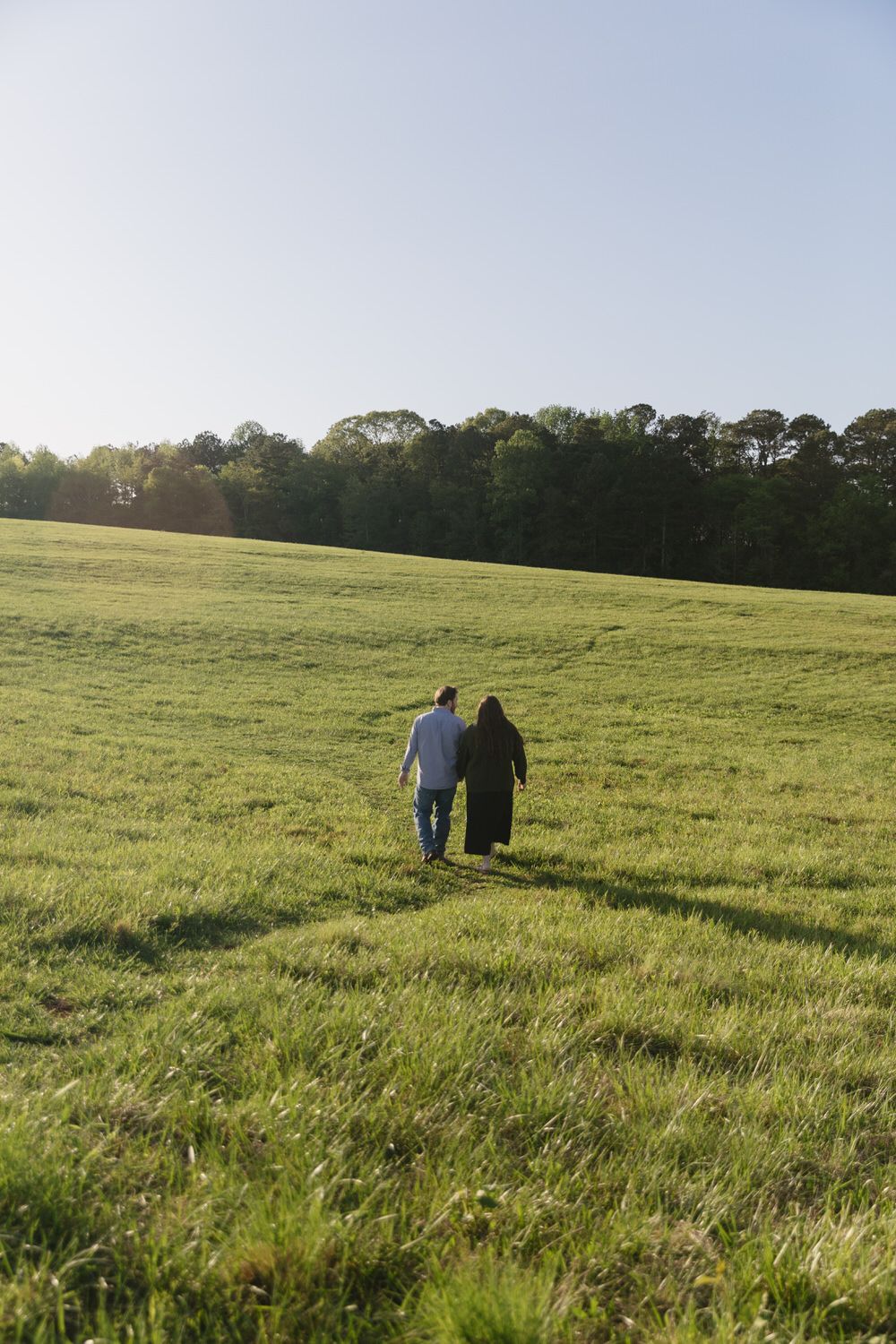 Playful couples session in Dallas Georgia fields