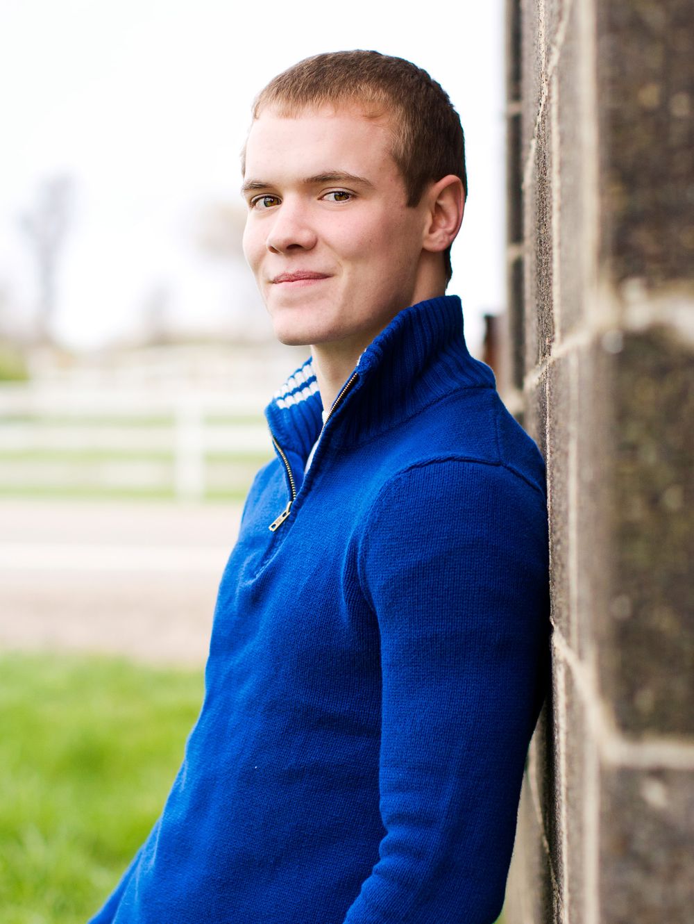 High school senior photo of boy close up; portrait session in Howell, Michigan by Brighton, MI photographer