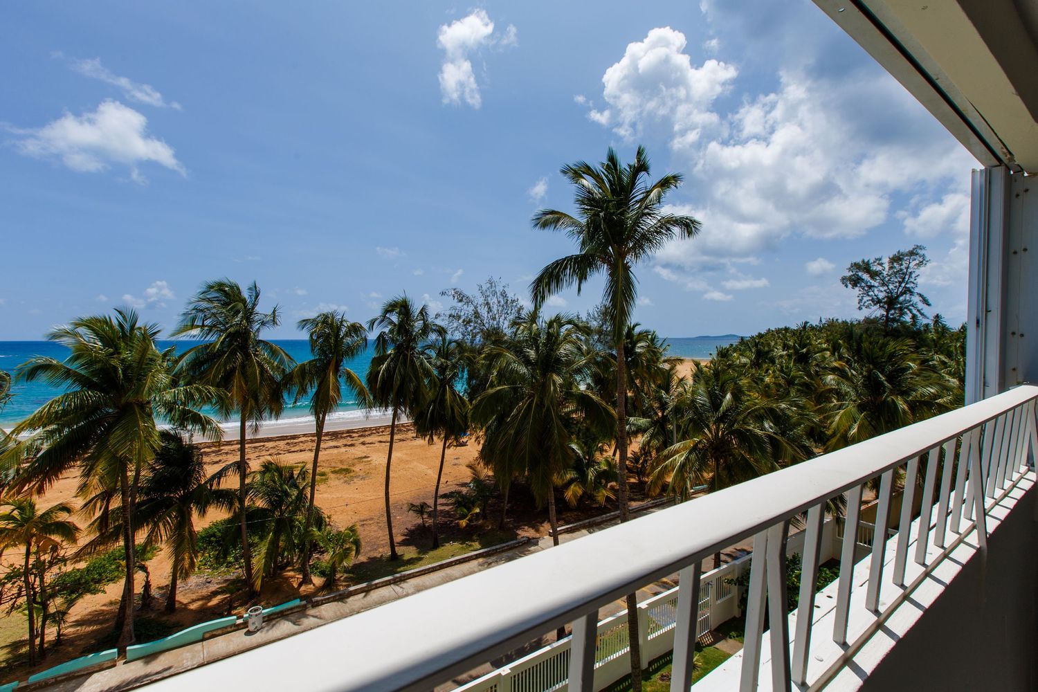 Real estate photography. Beach view. Short-term rental in Playa Azul Tower 1 in Luquillo, Puerto Rico.