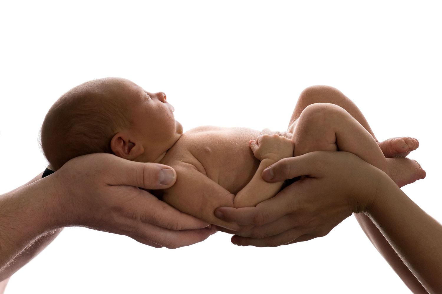 Newborn baby sleeping on cream blanket – newborn photographer Haverhill Suffolk