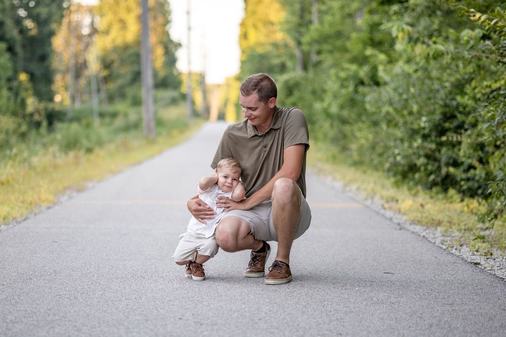 Springfield, IL Photographer captures a boy with his dad being silly during a photo session in Central IL