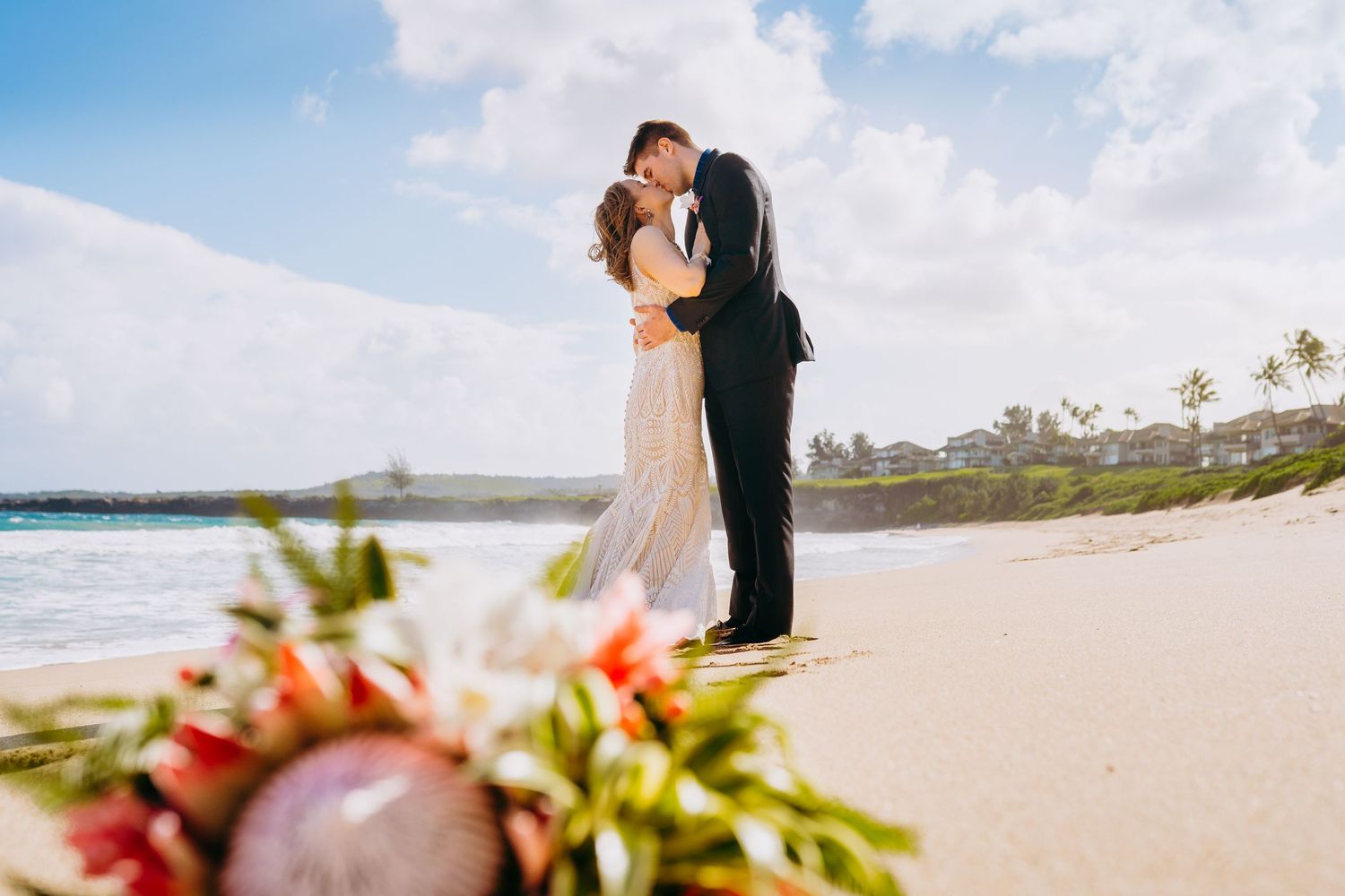 Beach wedding ceremony with tropical flowers and ocean backdrop.  Maui Hawaii wailea kihei makena beach wedding ceremony