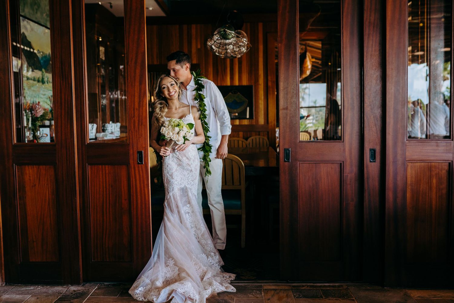 Dark wood-paneled wedding venue interior with rustic elegant decor and natural lighting. Maui Hawaii kaanapali sheraton duke's hawaii photo