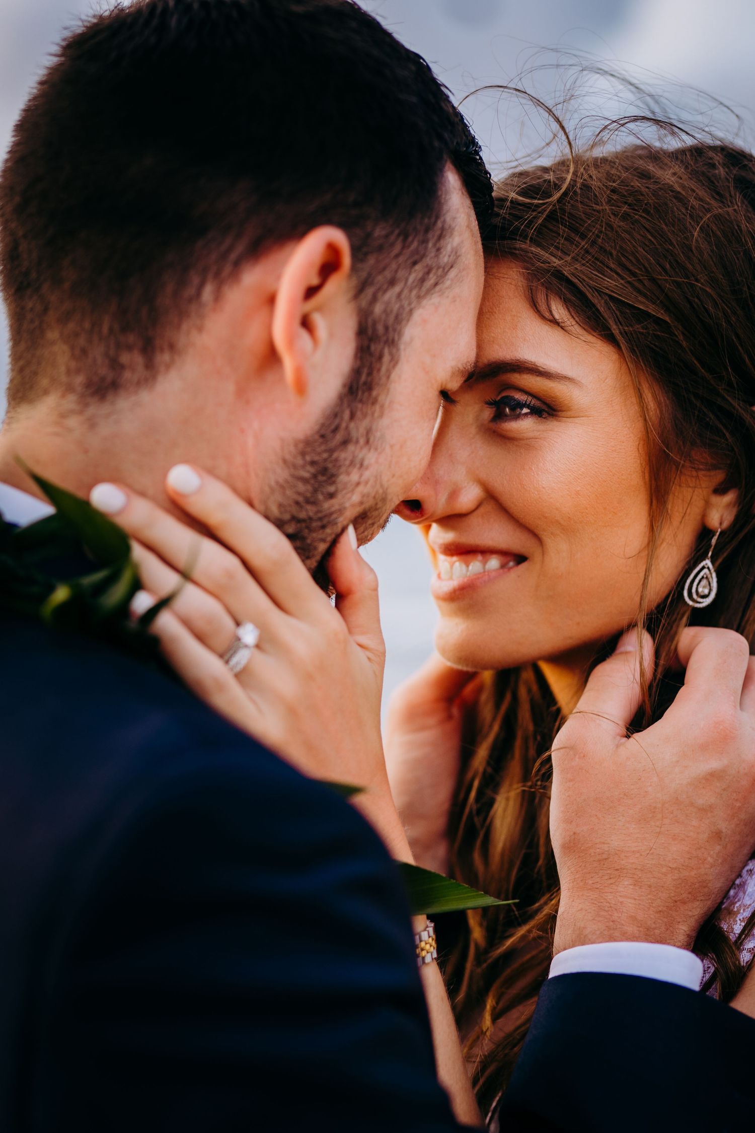 Intimate close-up of romantic moment between couple during sunset. Maui Hawaii Kaanapali Kapalua Merrimans wedding Napili Ritz Carlton