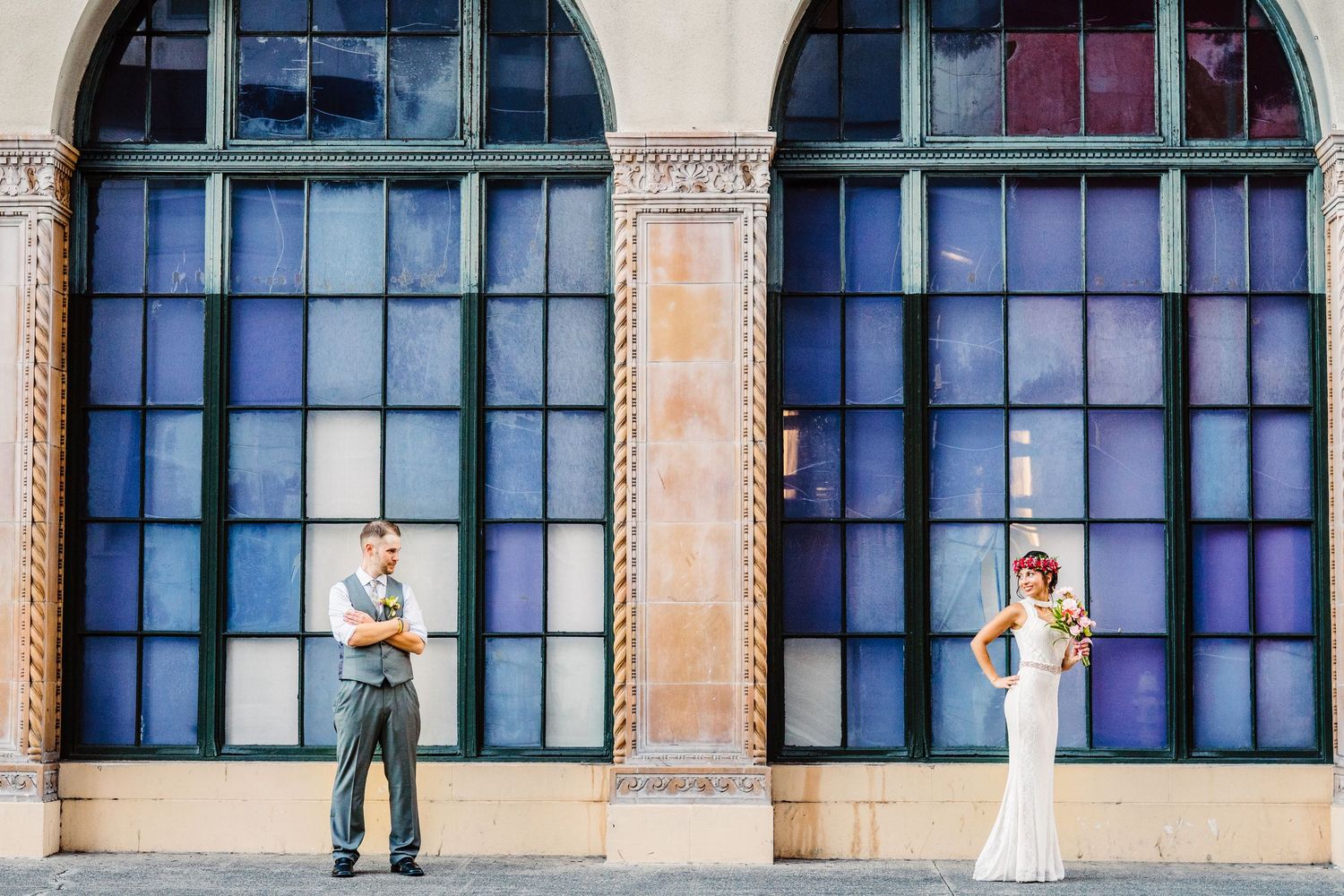 Architectural detail of ornate arched windows on a classic building facade. Maui Hawaii Ohau Hawaii Honolulu Cafe Julia Wedding