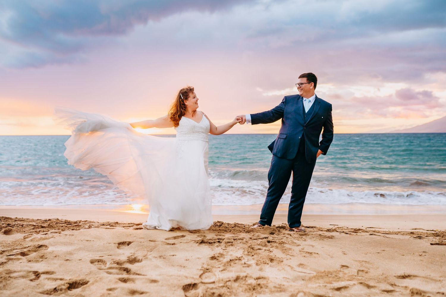 Intimate beach wedding for plus size bide captured in a close-up shot at golden hour. Maui Hawaii wailea kihei makena beach wedding ceremony