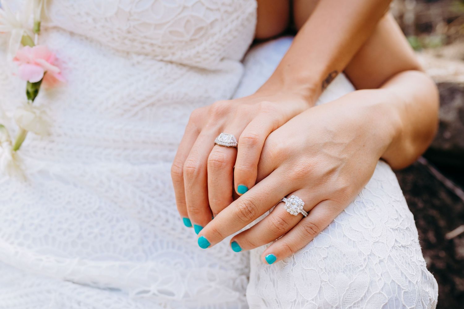 Close-up details of lace wedding dress and turquoise nail polish.  Maui Hawaii iao kihei wailea same sex wedding LGBTQ photographer