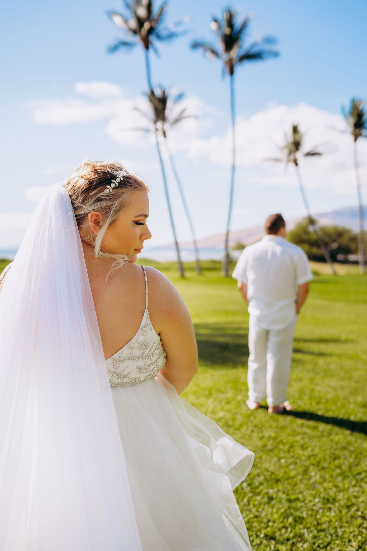 Intimate beach wedding for plus size bide captured in a close-up shot at golden hour. Maui Hawaii wailea kihei makena beach wedding ceremony