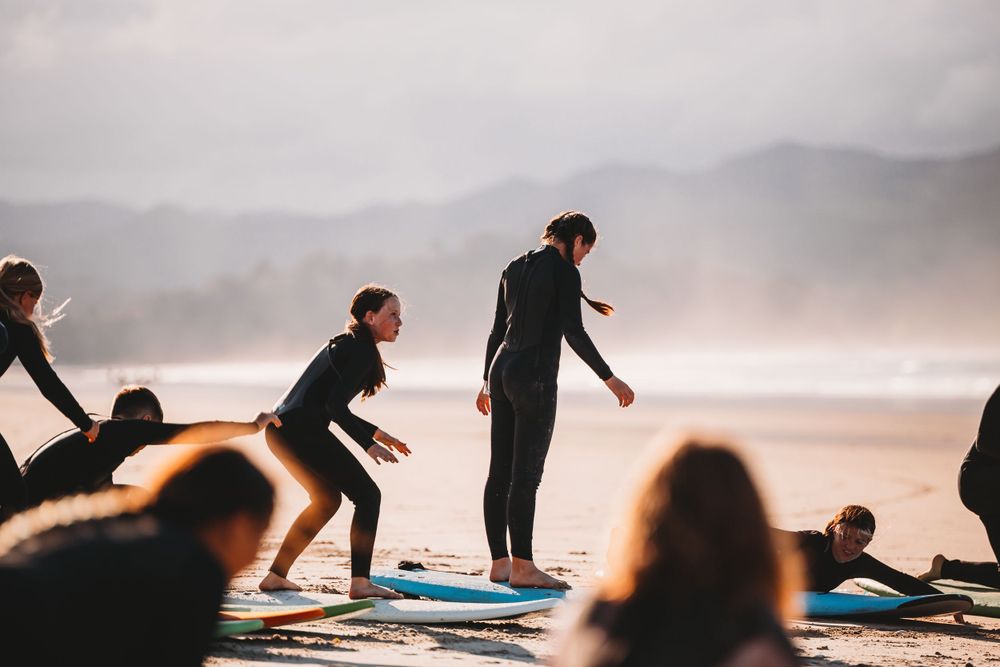 Surf Coromandel - learn to surf lessons by Jenna James Photographer