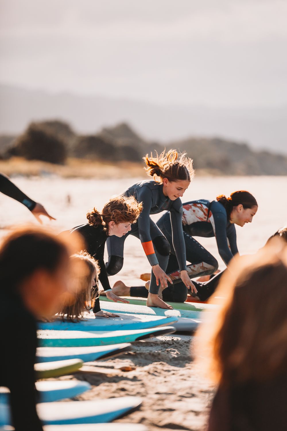 Surf Coromandel - learn to surf lessons by Jenna James Photographer