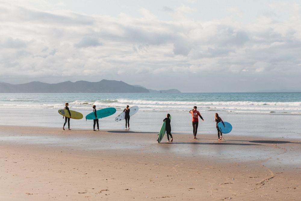 Surf Coromandel - learn to surf lessons by Jenna James Photographer
