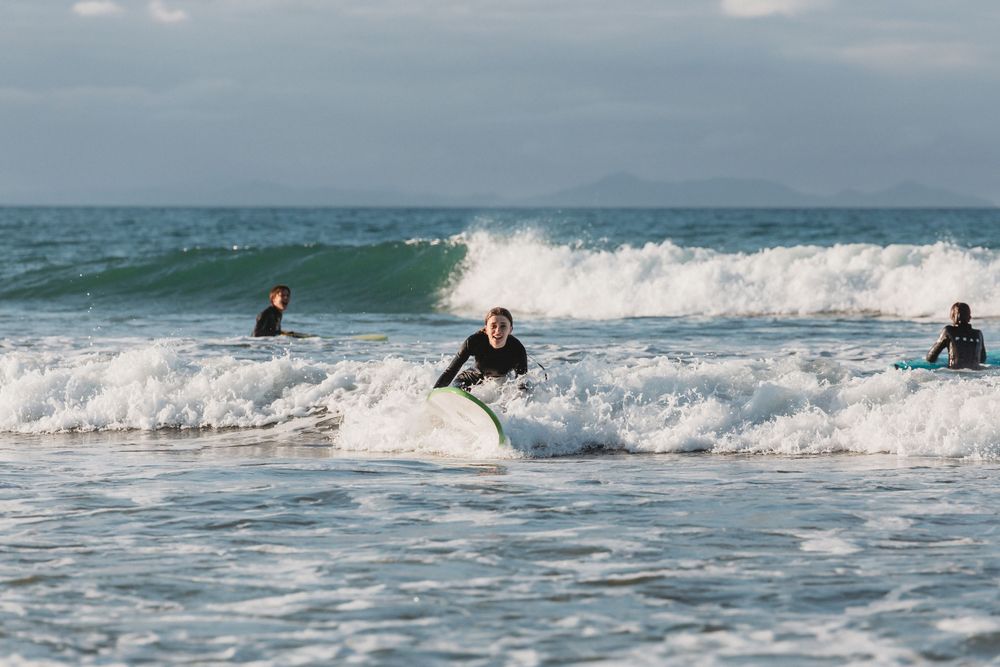 Surf Coromandel - learn to surf lessons by Jenna James Photographer