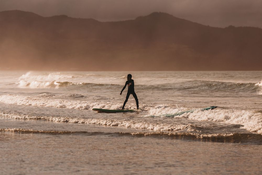 Surf Coromandel - learn to surf lessons by Jenna James Photographer