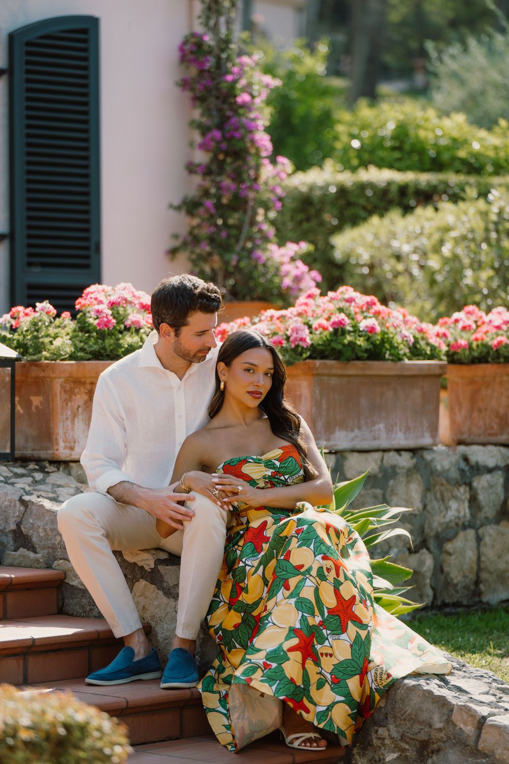 Elegant engagement shoot in the gardens of Grand Hotel Timeo, captured in natural light.