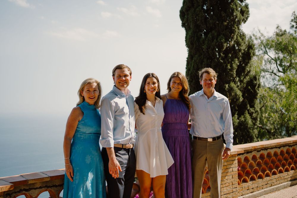 Family portrait after a proposal in Taormina