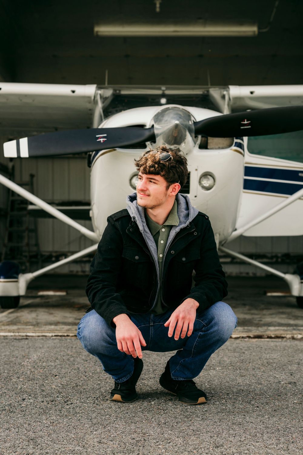 Man in front of plane