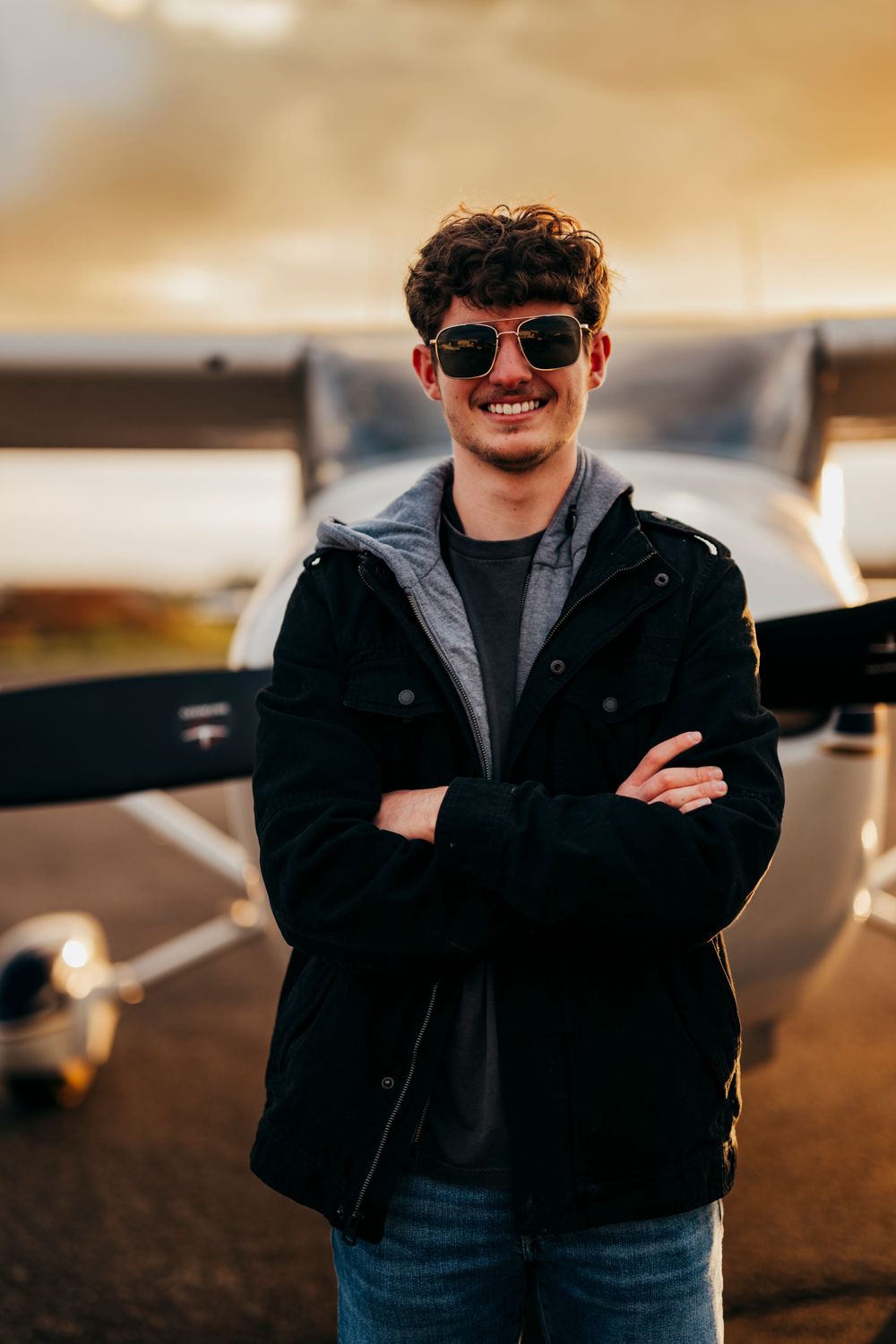 Man in front of plane