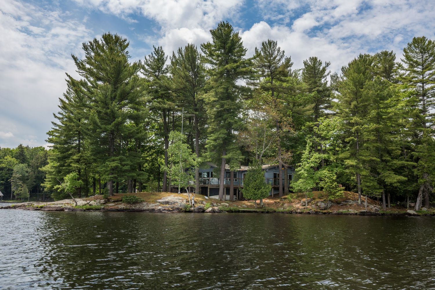 A photo of a cottage in Muskoka Lakes Ontario for a real estate listing in Muskoka photographed by Sarah Tennant