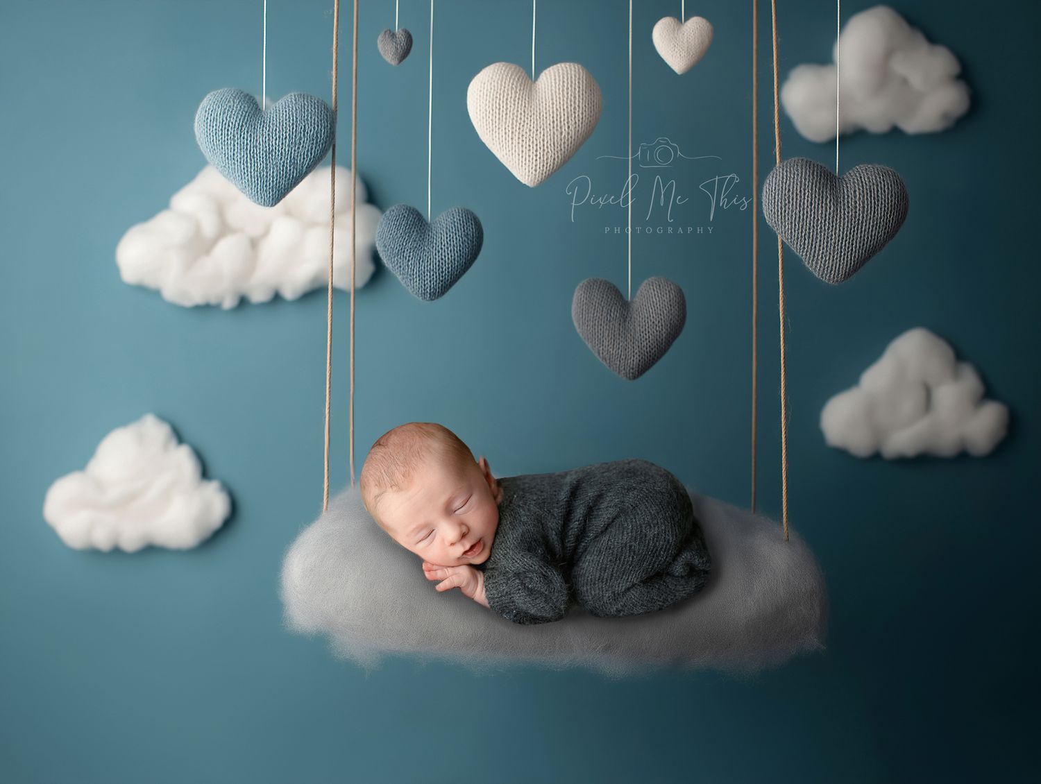 A newborn on a cloud with floating hearts. Greenville, SC newborn photographer, Easley SC newborn photographer, Upstate SC newborn photograp
