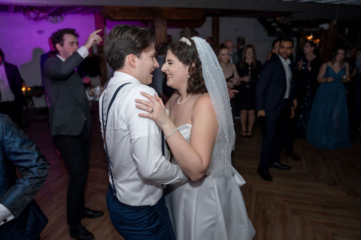 Photo of a bride and groom at a reception showing deep contrasting colours.