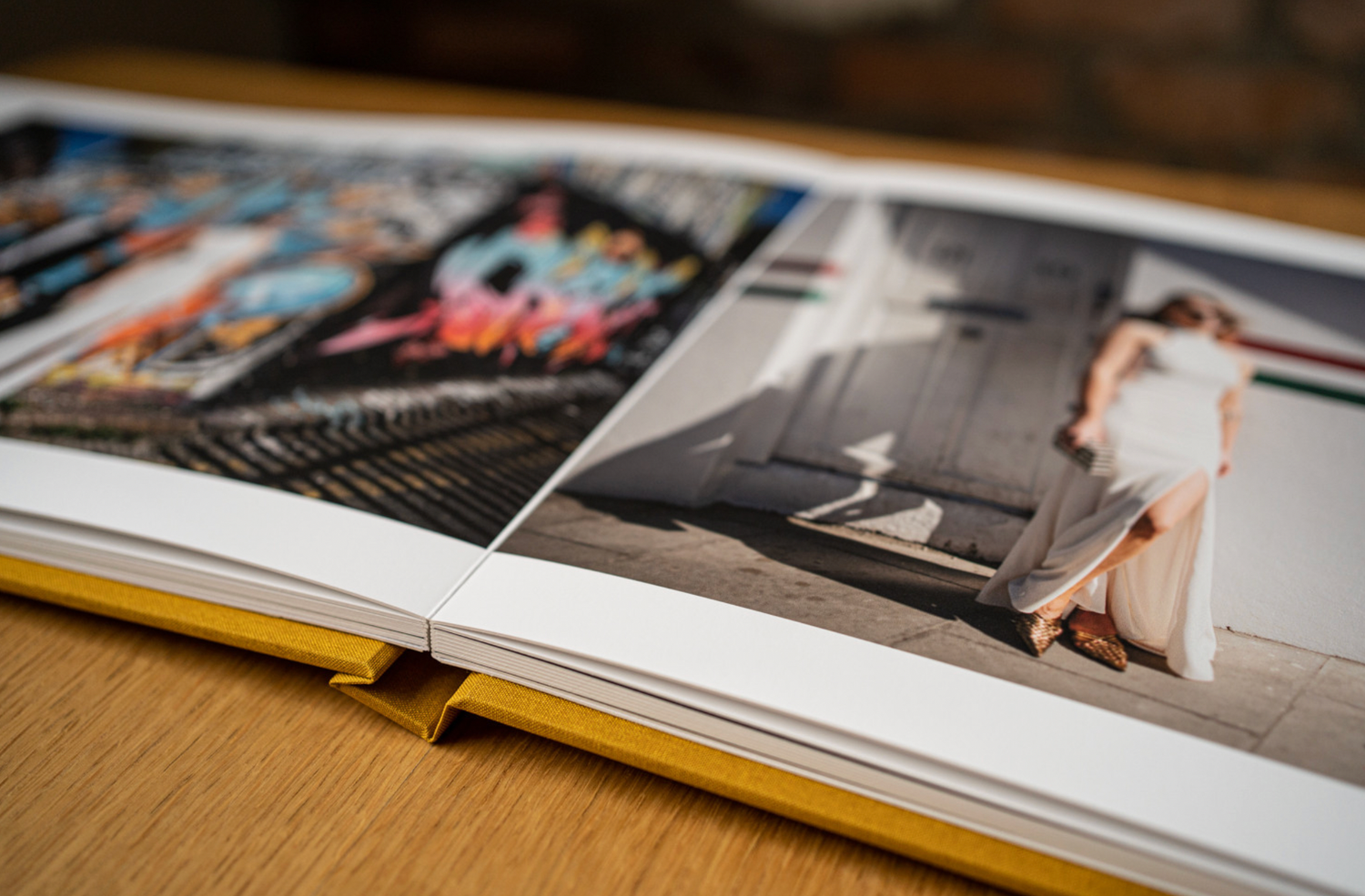 A series of hardcover books shown at different angles displaying their green covers and spines on a gray surface.