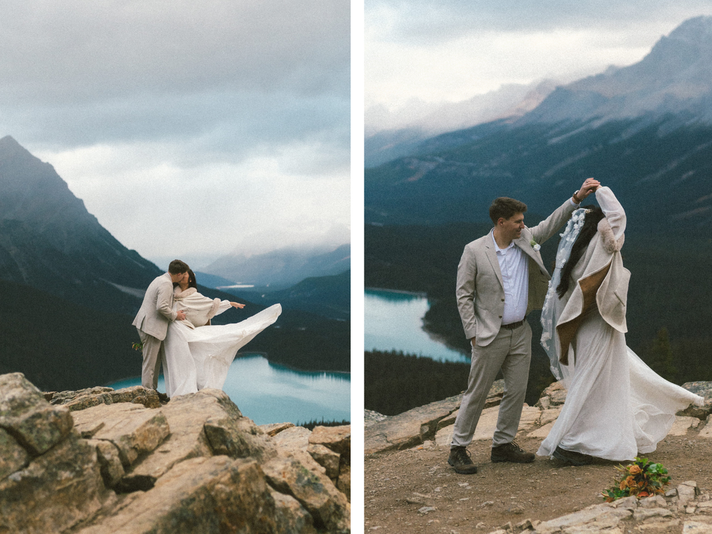 bride's dress fans out around her as groom spins her around on a lookout point above Peyto Lake in Banff