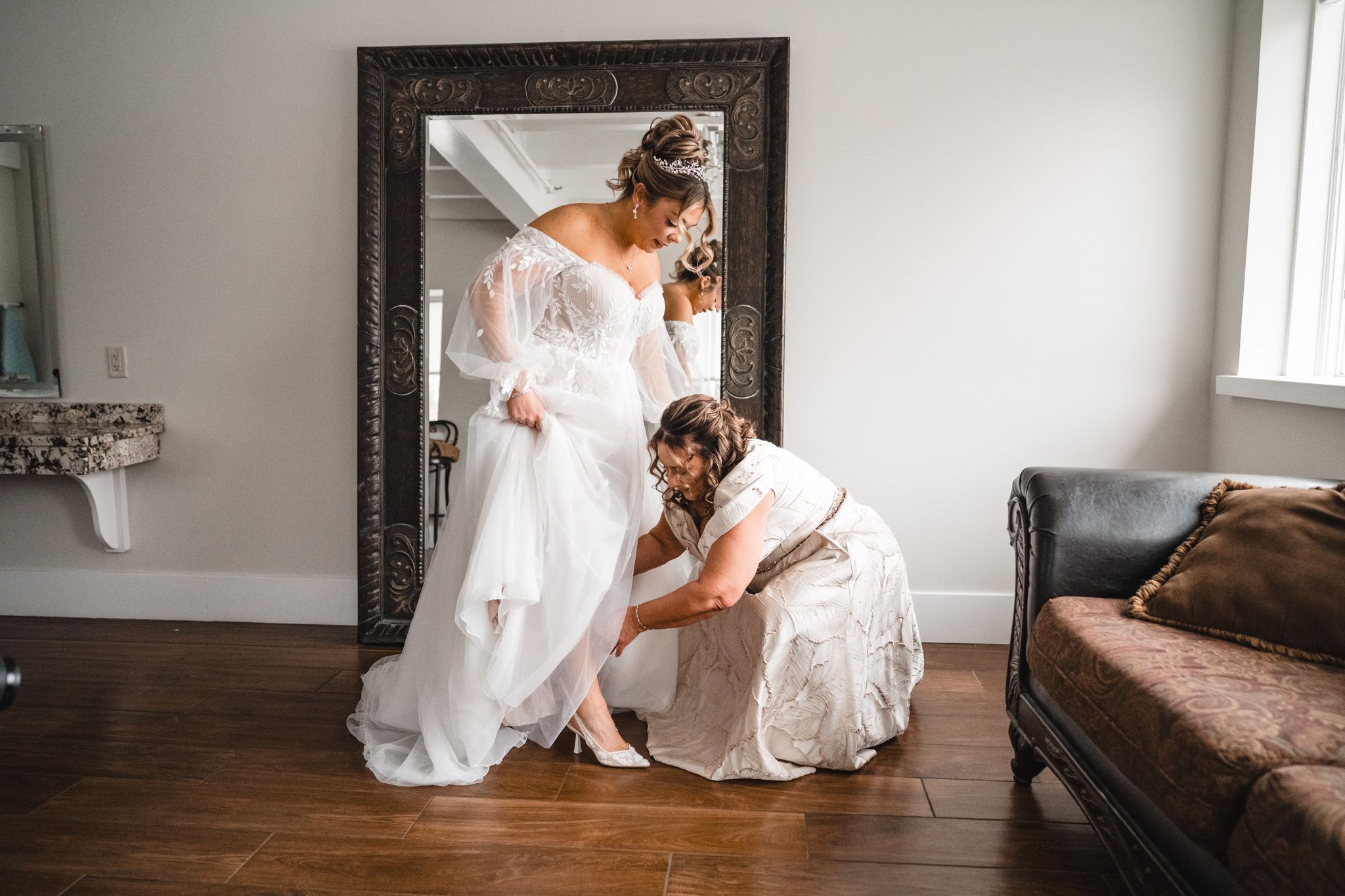 Wedding dress preparations captured from various angles in a minimalist room.