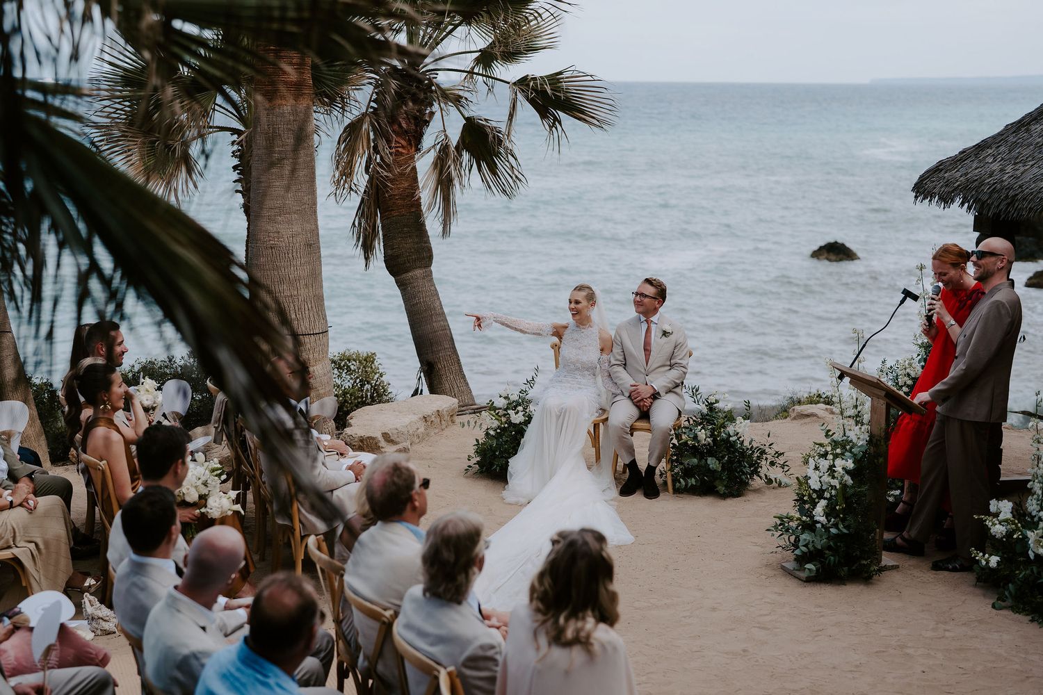 bride and groom laughing during reading during ceremony at amante ibiza