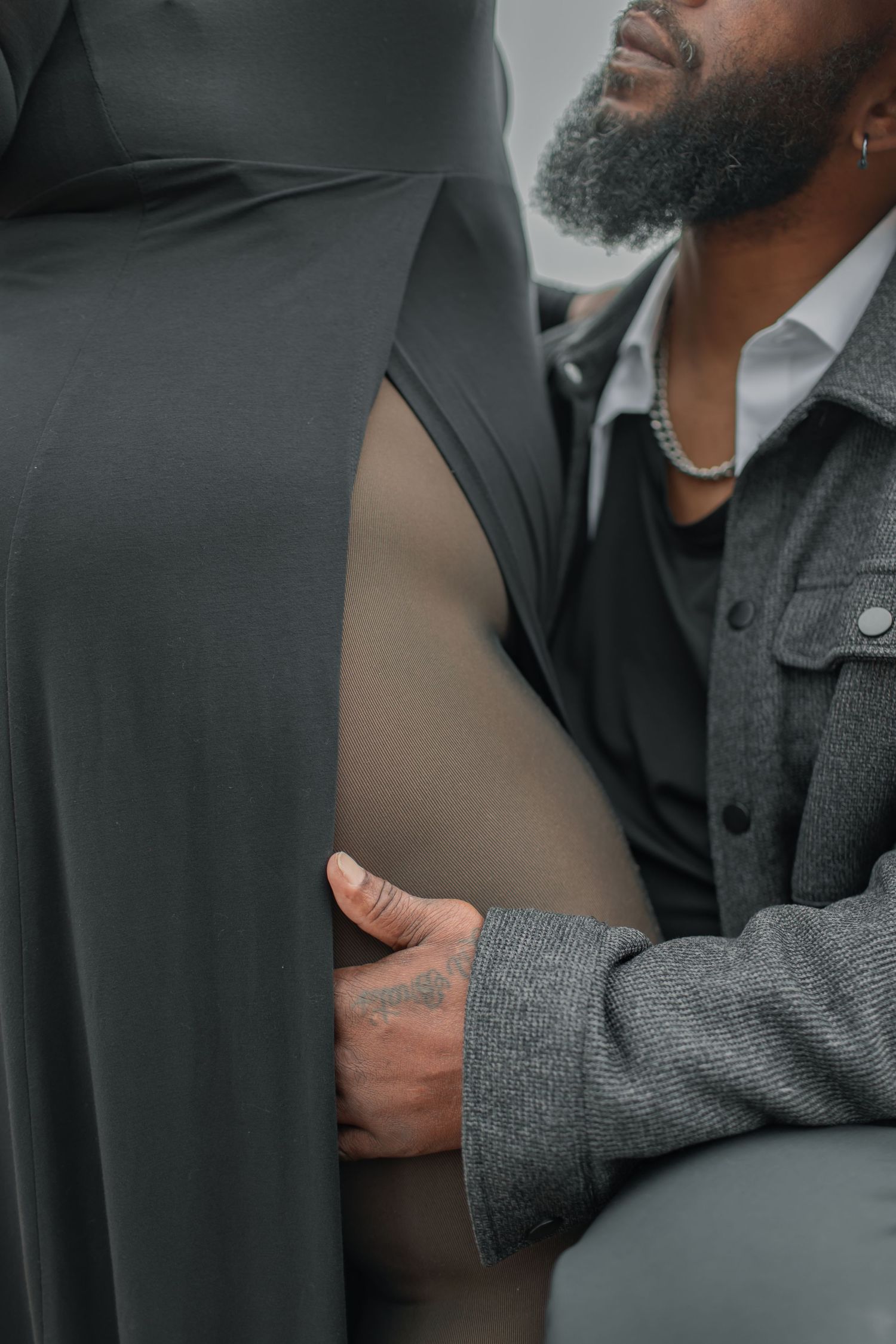Close up view of people in business attire having a conversation in a professional setting.