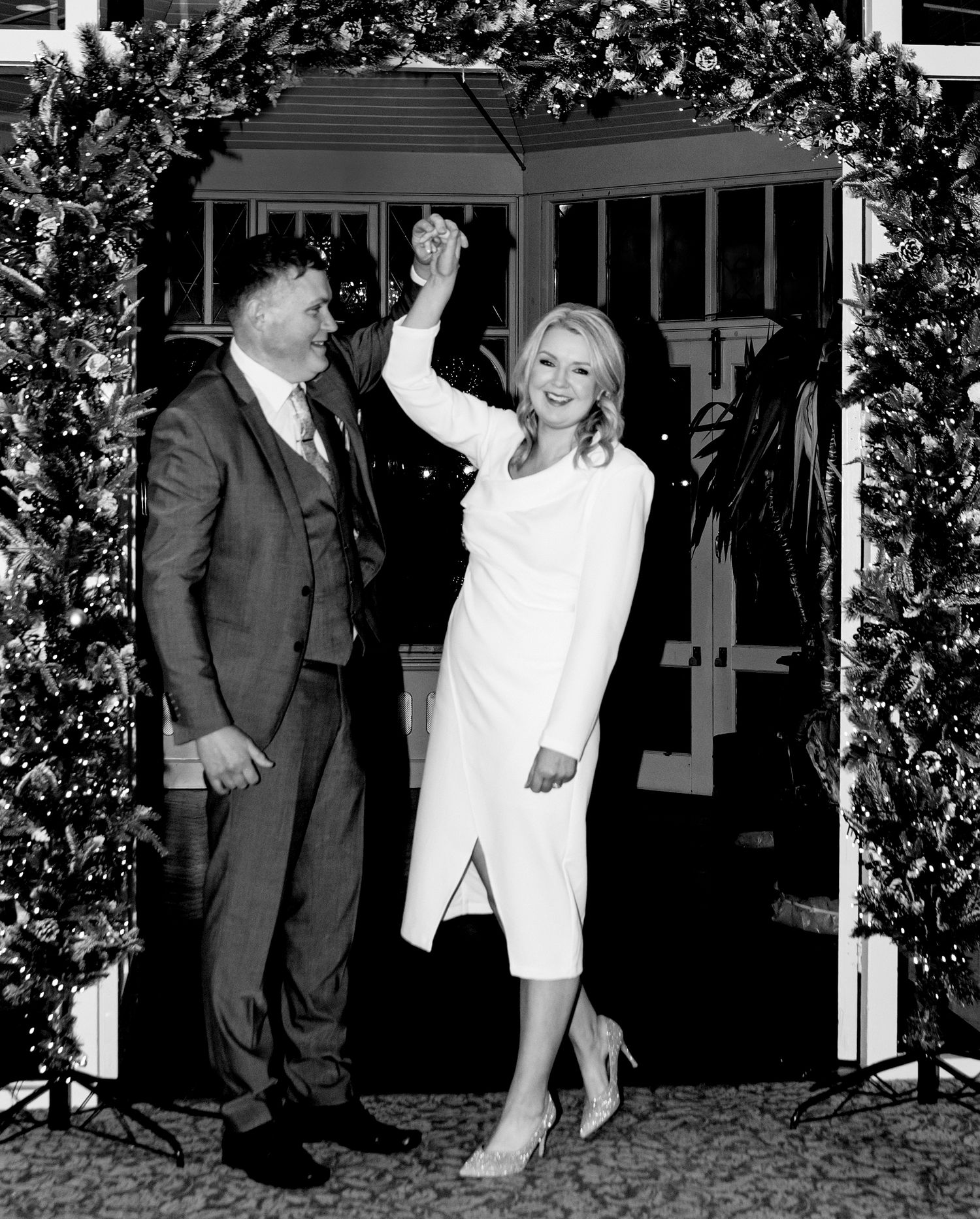 Series of black and white wedding photos showing joyful celebration moments.