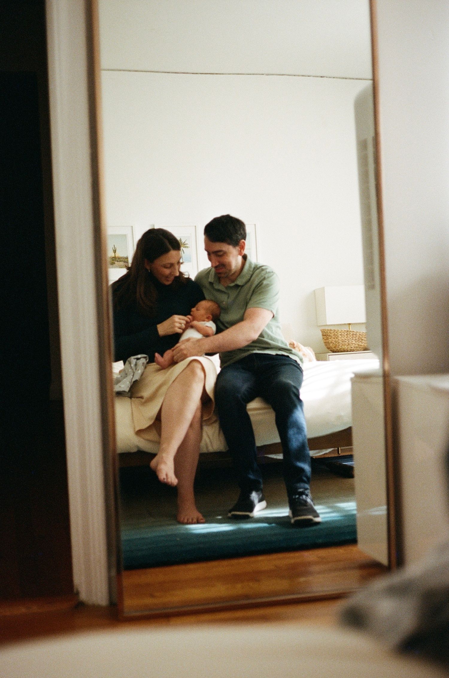 lifestyle newborn session on 35mm film in the San Francisco Bay Area capturing quiet moments at home
