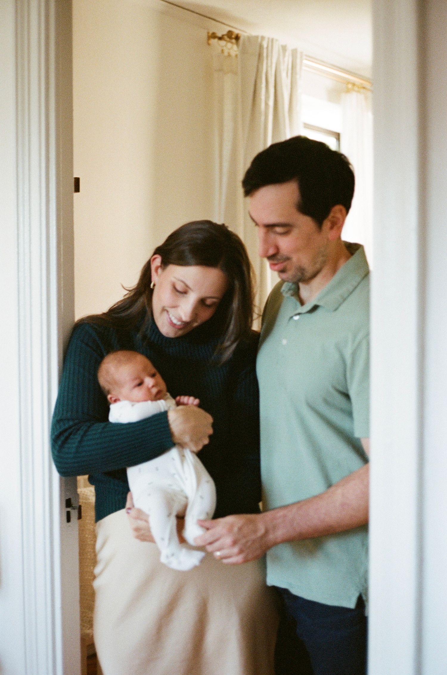 lifestyle newborn session on 35mm film in Marin capturing quiet moments at home