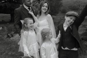 A black and white collage of wedding photos showing joyful moments and celebrations at an outdoor venue.