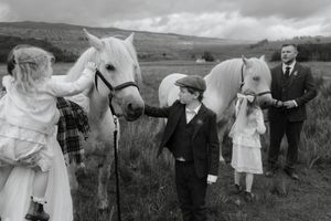 A series of black and white vintage photographs showing people with horses in a rural countryside setting.