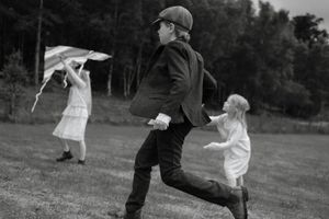 A series of black and white dance photos showing graceful movements and poses in an outdoor setting.