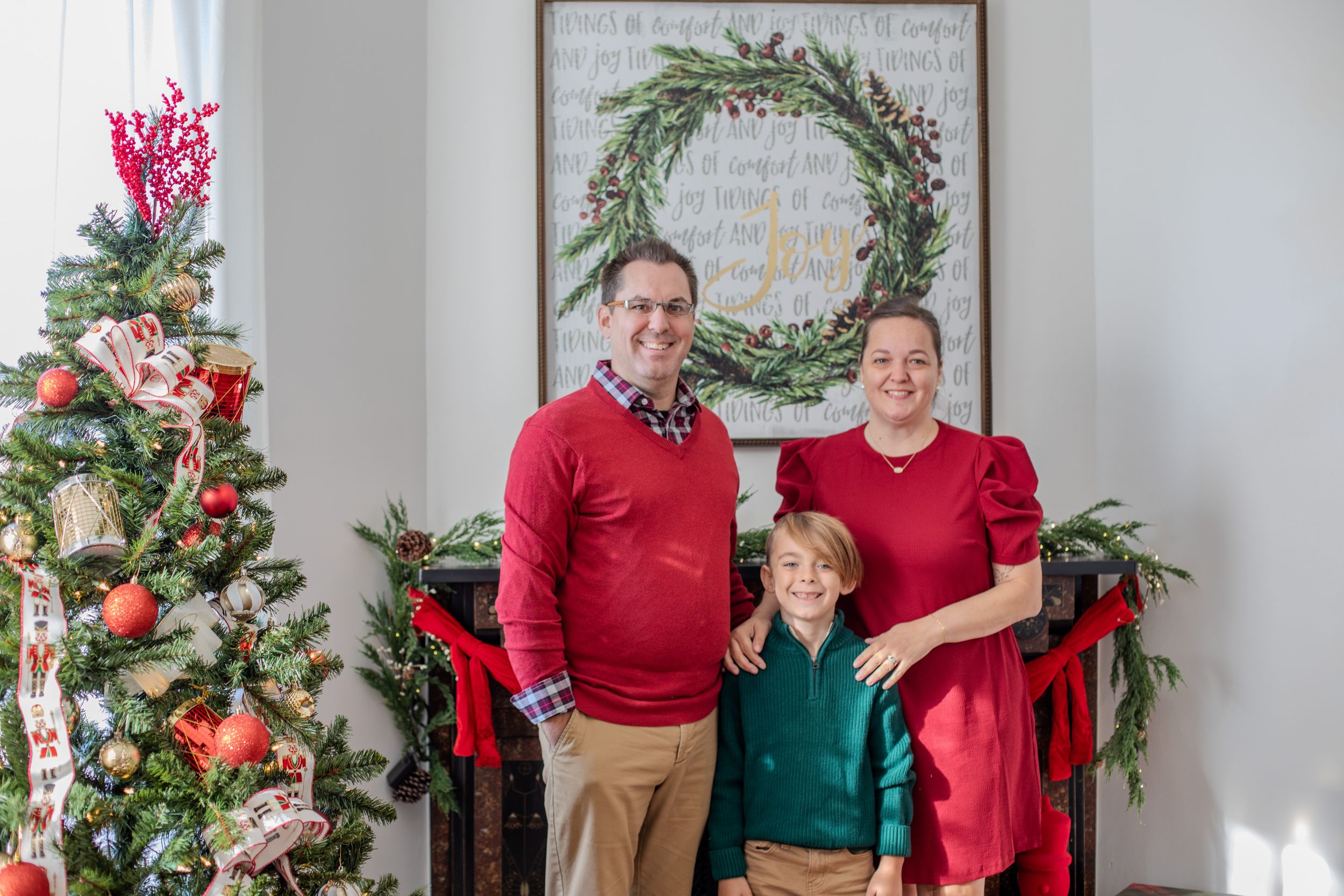 Cincinnati studio Christmas mini session capturing families in festive holiday portraits with professional photography and seasonal props.
