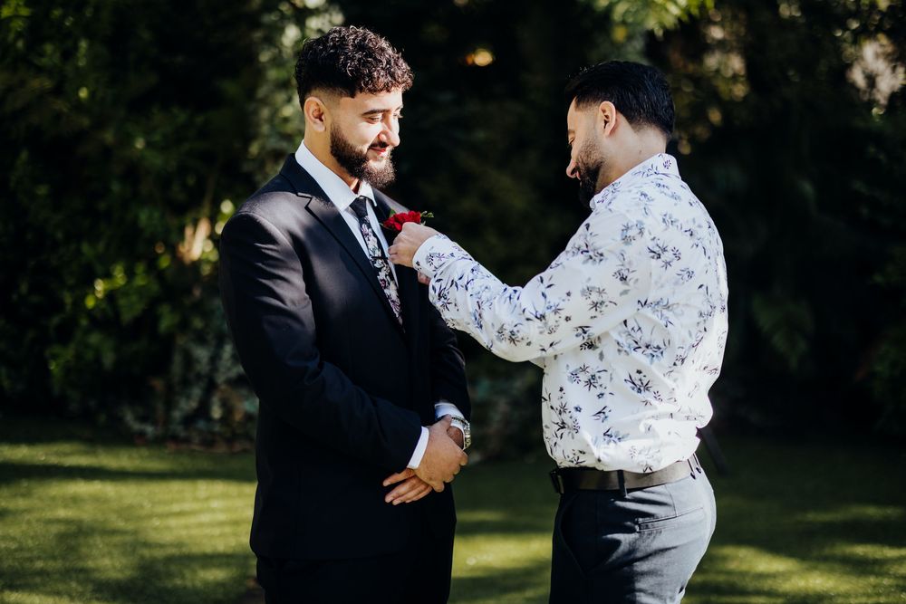 Couple dancing together outdoors during a romantic wedding celebration.