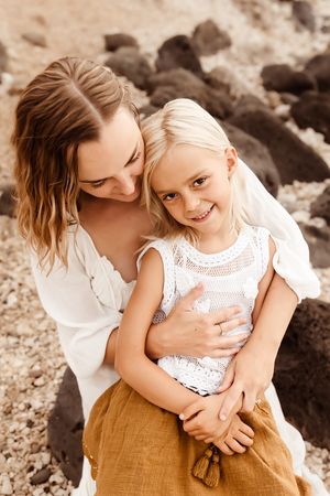 Oahu Family Photographer captures a family at sunset in Hawaii.
