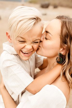 Oahu Family Photographer captures a family at sunset in Hawaii.