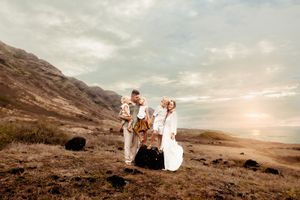 Oahu Family Photographer captures a family at sunset in Hawaii.