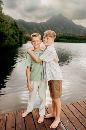 Oahu Family Photographer captures a family at sunset in Hawaii.