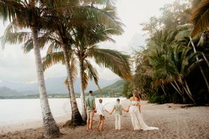 Oahu Family Photographer captures a family at sunset in Hawaii.