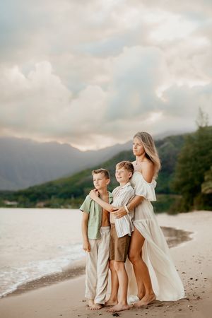 Oahu Family Photographer captures a family at sunset in Hawaii.