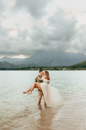Oahu Family Photographer captures a family at sunset in Hawaii.
