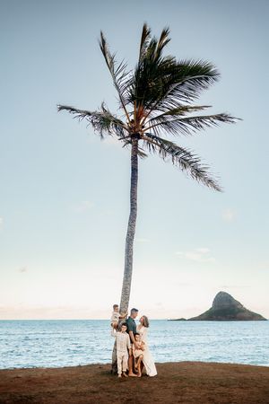 Oahu Family Photographer captures a family at sunset in Hawaii.